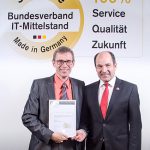 ASPION Geschäftsführer Michael Wöhr nimmt die BITMI-Auszeichnung "Software Made in Germany" entgegen.